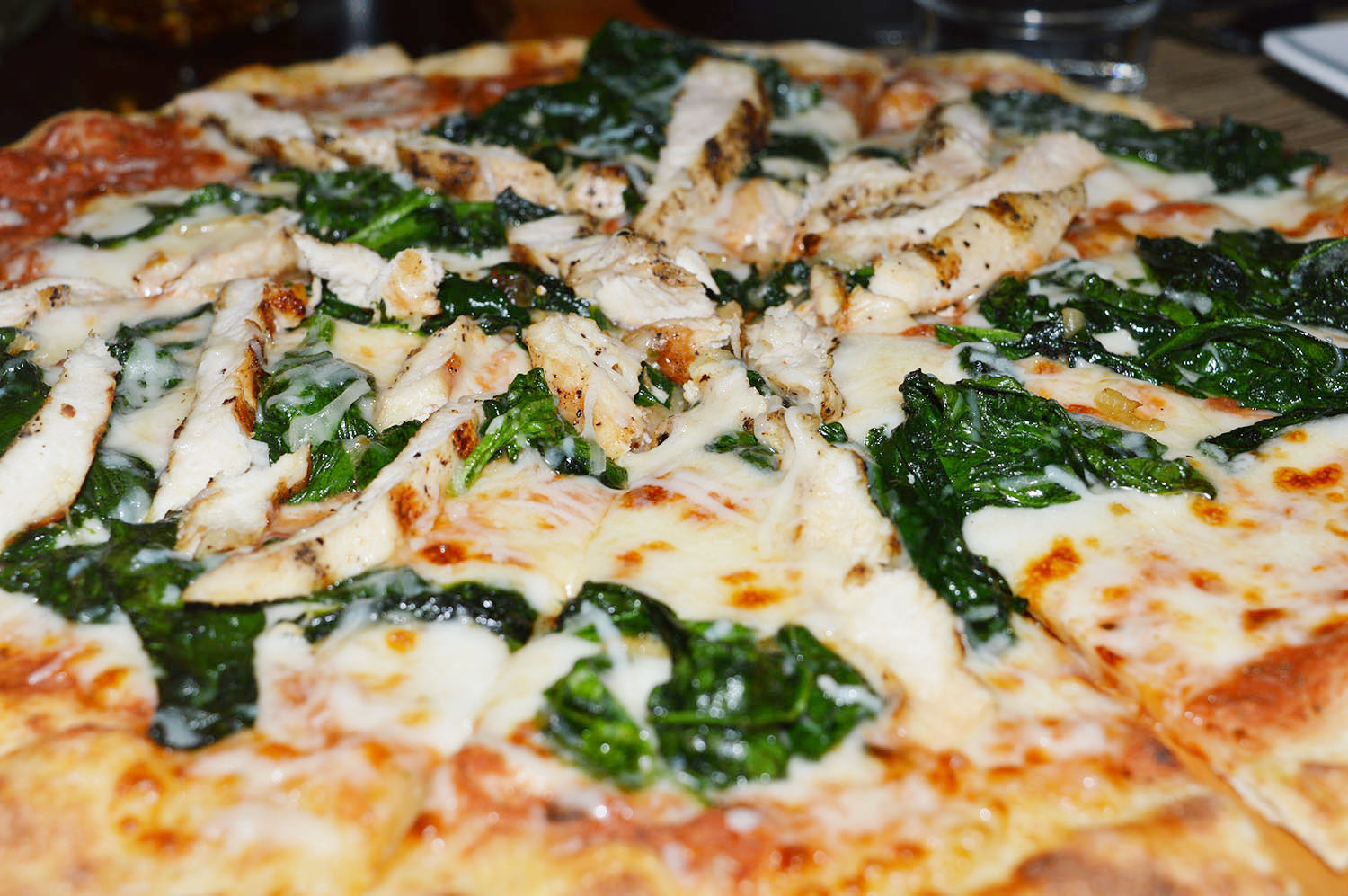 Chicken & Spinach Pizza - Photo Credit: thespotist.com